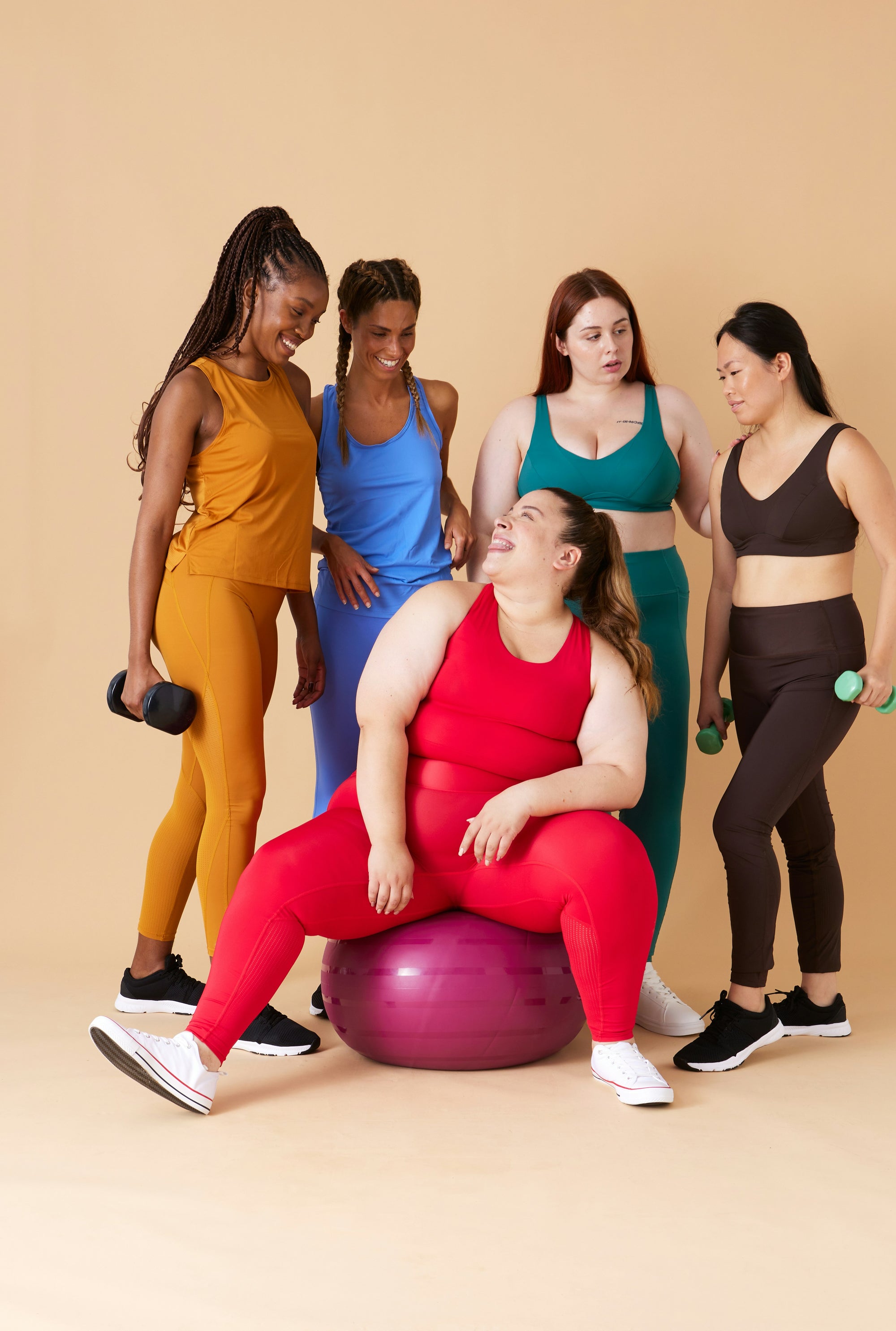 Diverse women in gym clothes